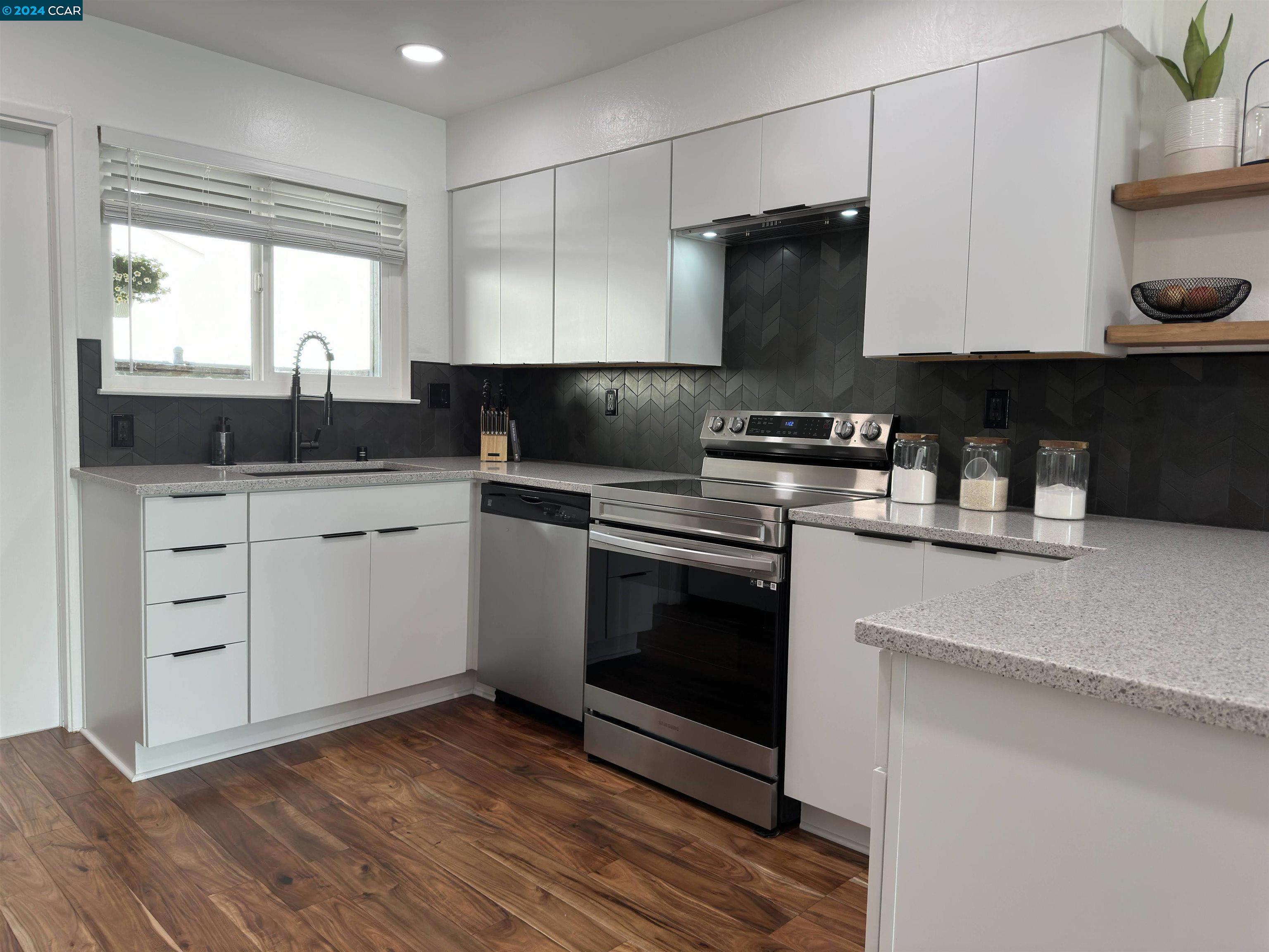 Concord Concord, CA 94520 - Photo 1 of 1 a kitchen with a sink and a stove
