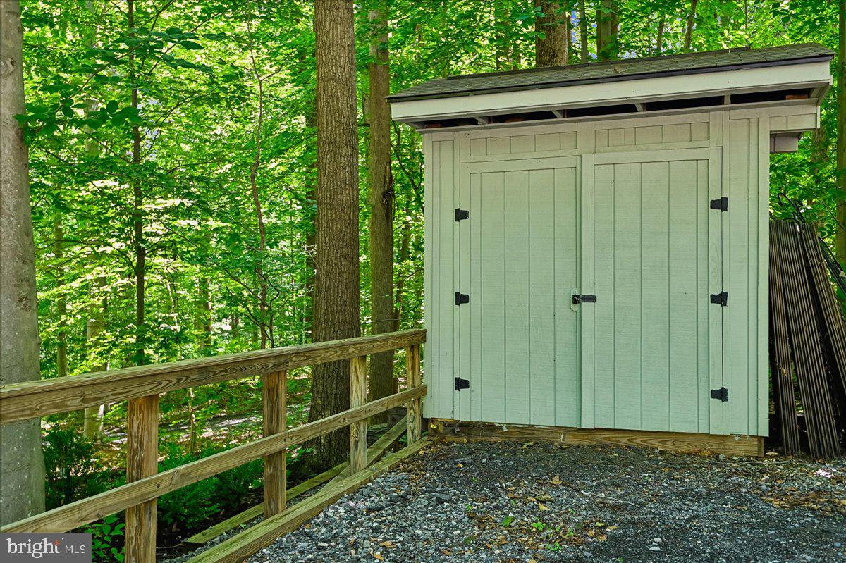 3633 Patuxent River Road Davidsonville, MD 21035 - Photo 69 of 85 Storage Shed Near Driveway for Yard Equipment