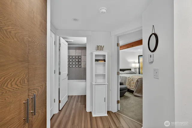 a view of a bedroom from a hallway