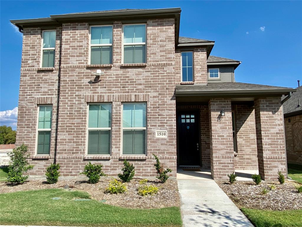 1510 Verbena Lane Garland, TX 75042 - Photo 1 of 10 a front view of a house with garden