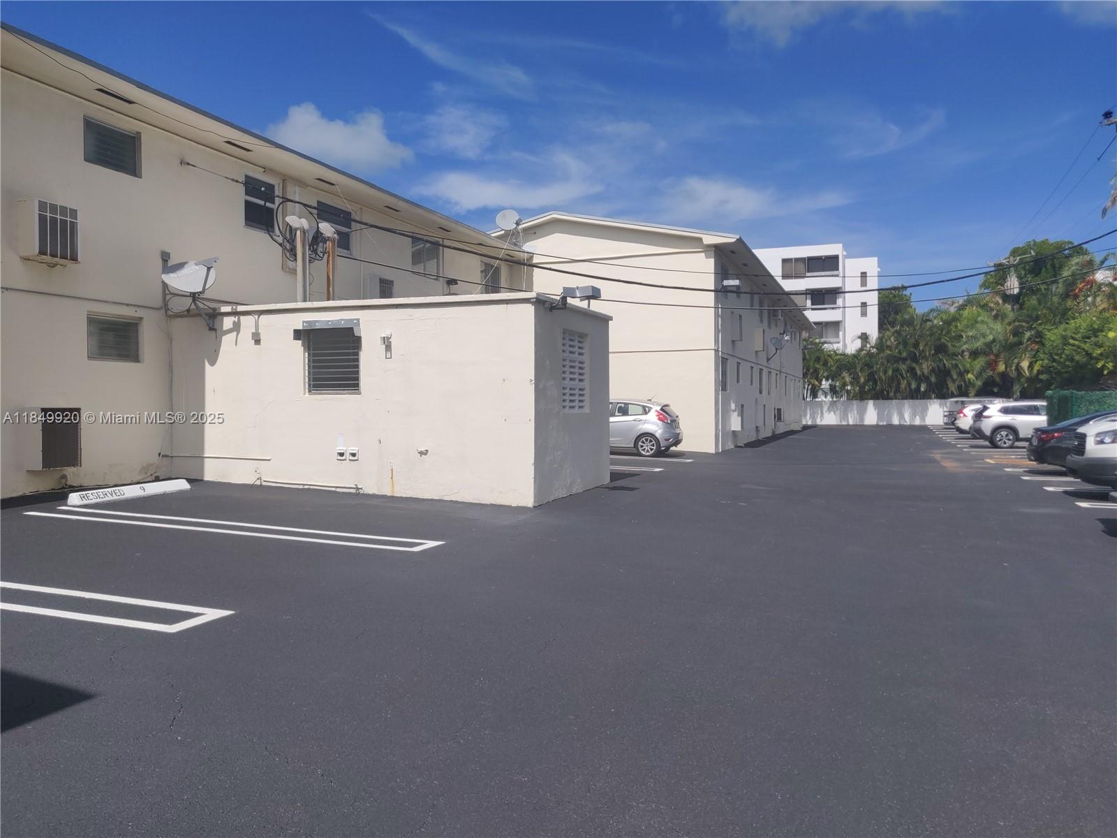 100 Sunrise Drive, Unit 9 Key Biscayne, FL 33149 - Photo 16 of 17 a view of parking with utility room