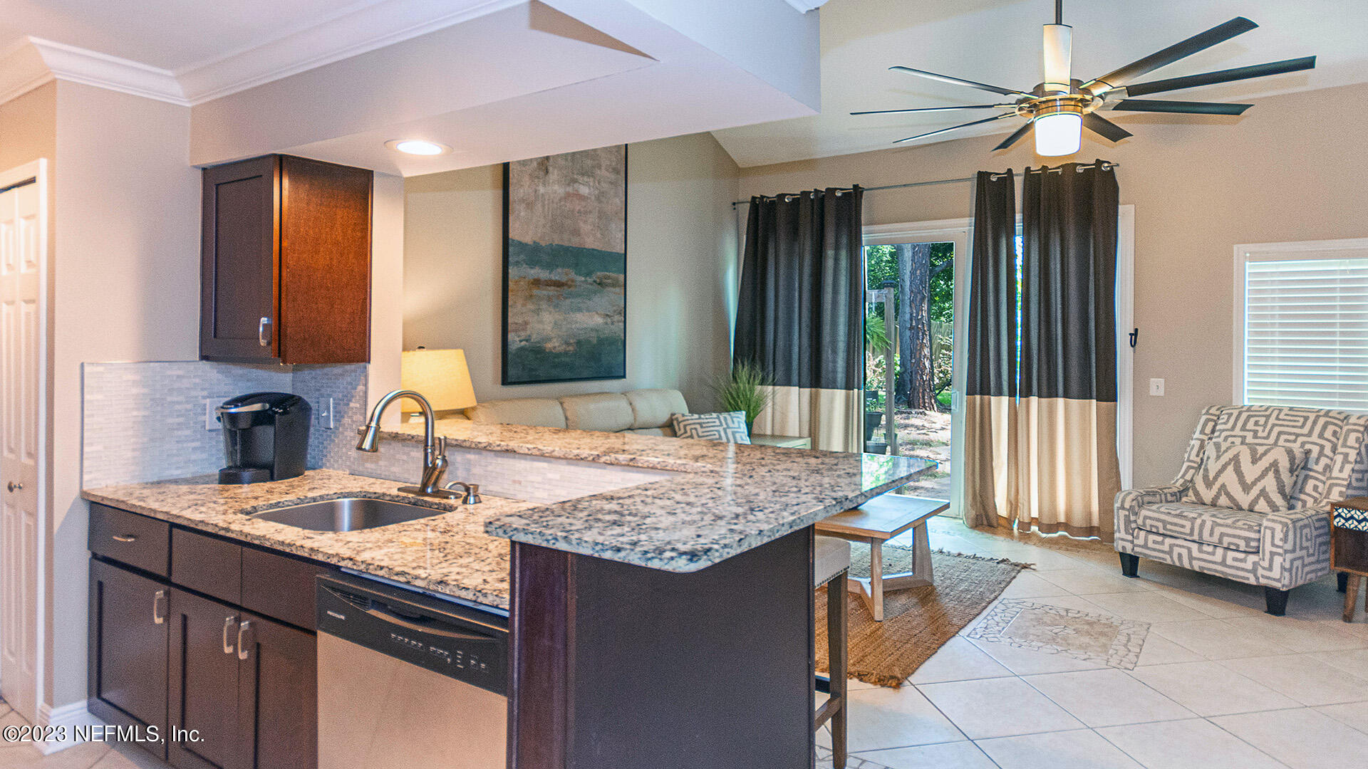 121 Sand Castle Way Neptune Beach, FL 32266 - Photo 17 of 39 a bathroom with a granite countertop sink and a mirror