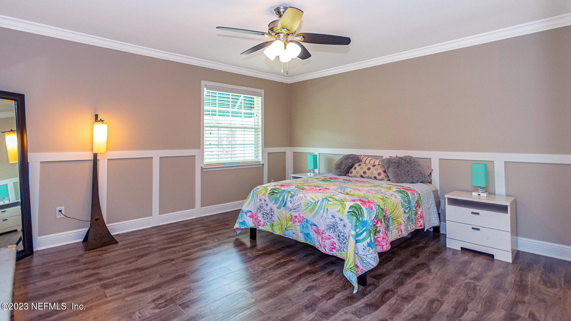 121 Sand Castle Way Neptune Beach, FL 32266 - Photo 22 of 39 a bedroom with a bed and a chandelier