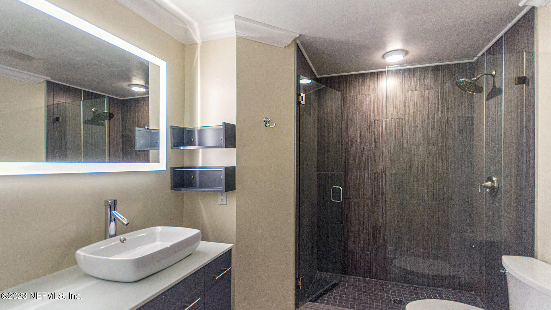 121 Sand Castle Way Neptune Beach, FL 32266 - Photo 24 of 39 a bathroom with a sink toilet and shower