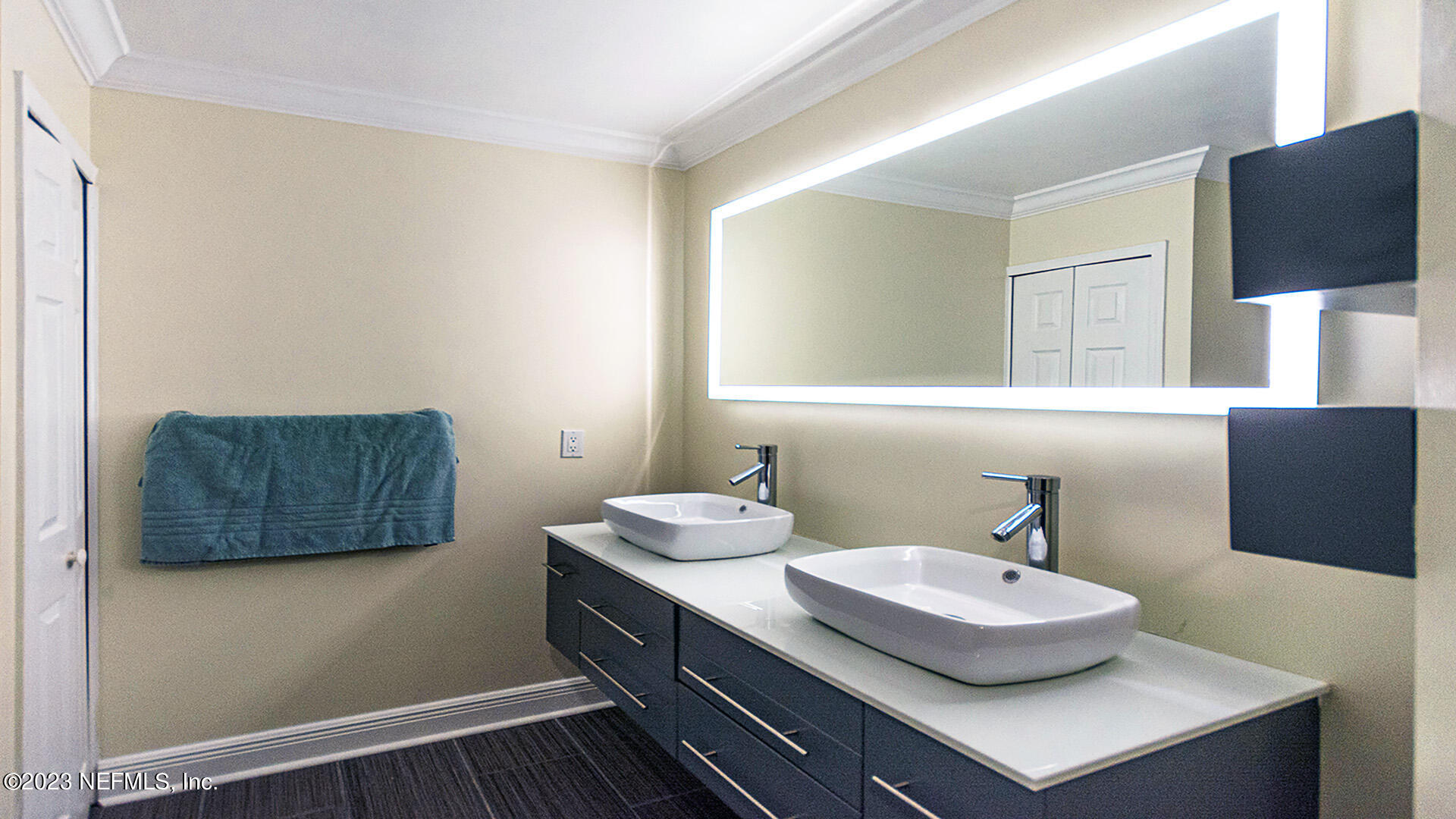 121 Sand Castle Way Neptune Beach, FL 32266 - Photo 26 of 39 a bathroom with a sink and a mirror