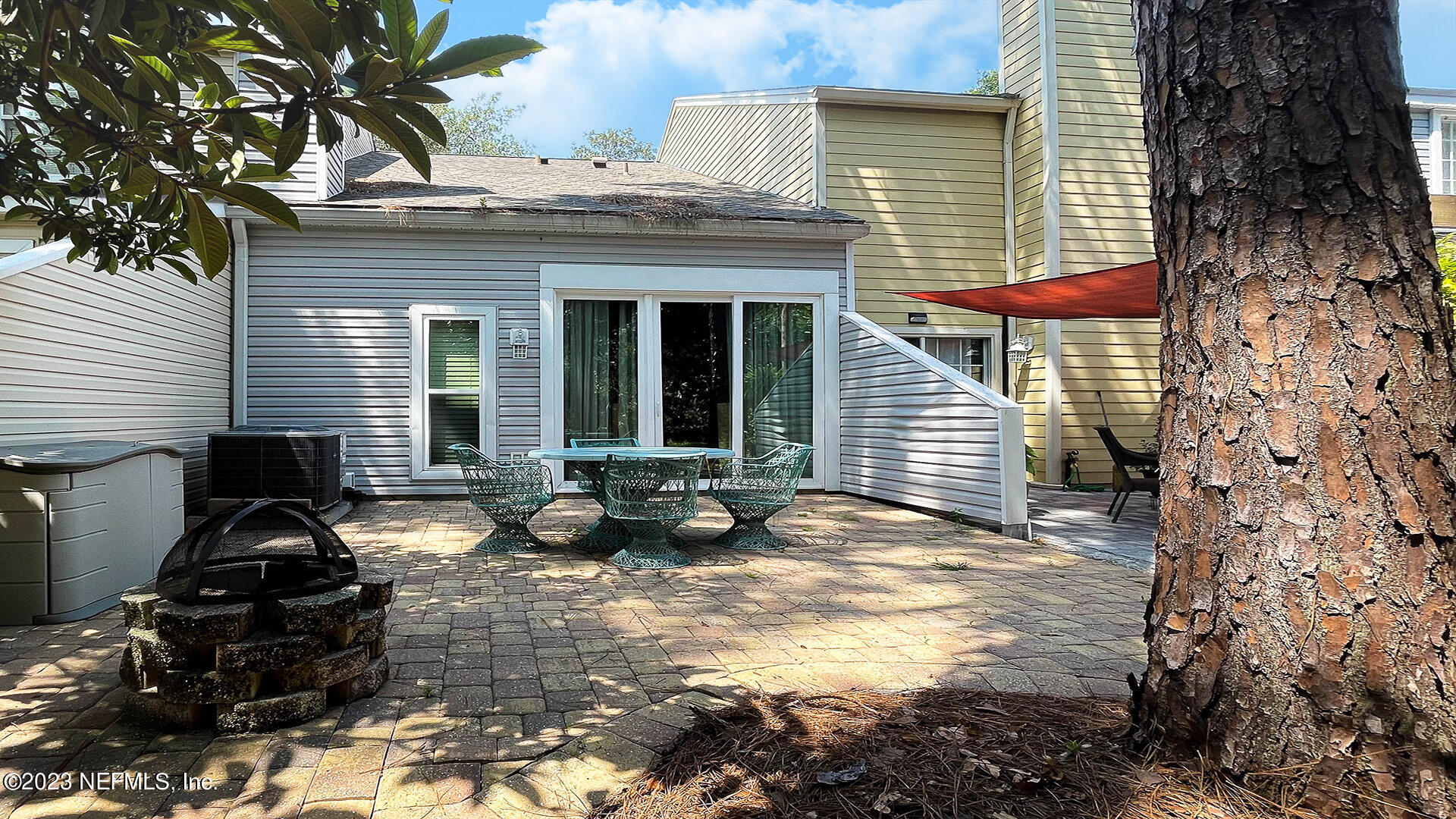 121 Sand Castle Way Neptune Beach, FL 32266 - Photo 27 of 39 a view of a house with patio