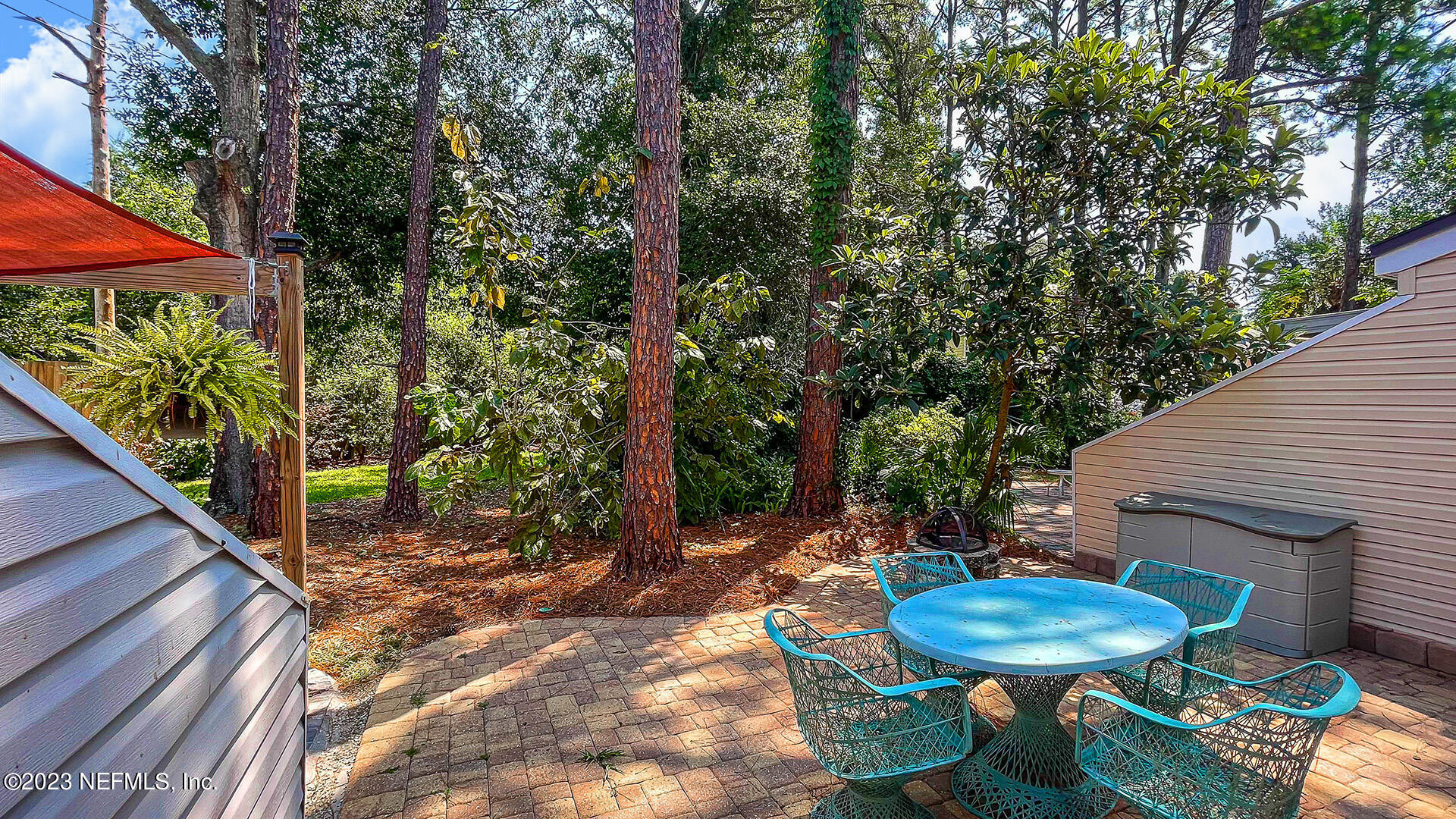 121 Sand Castle Way Neptune Beach, FL 32266 - Photo 29 of 39 a view of a backyard with furniture and outdoor seating