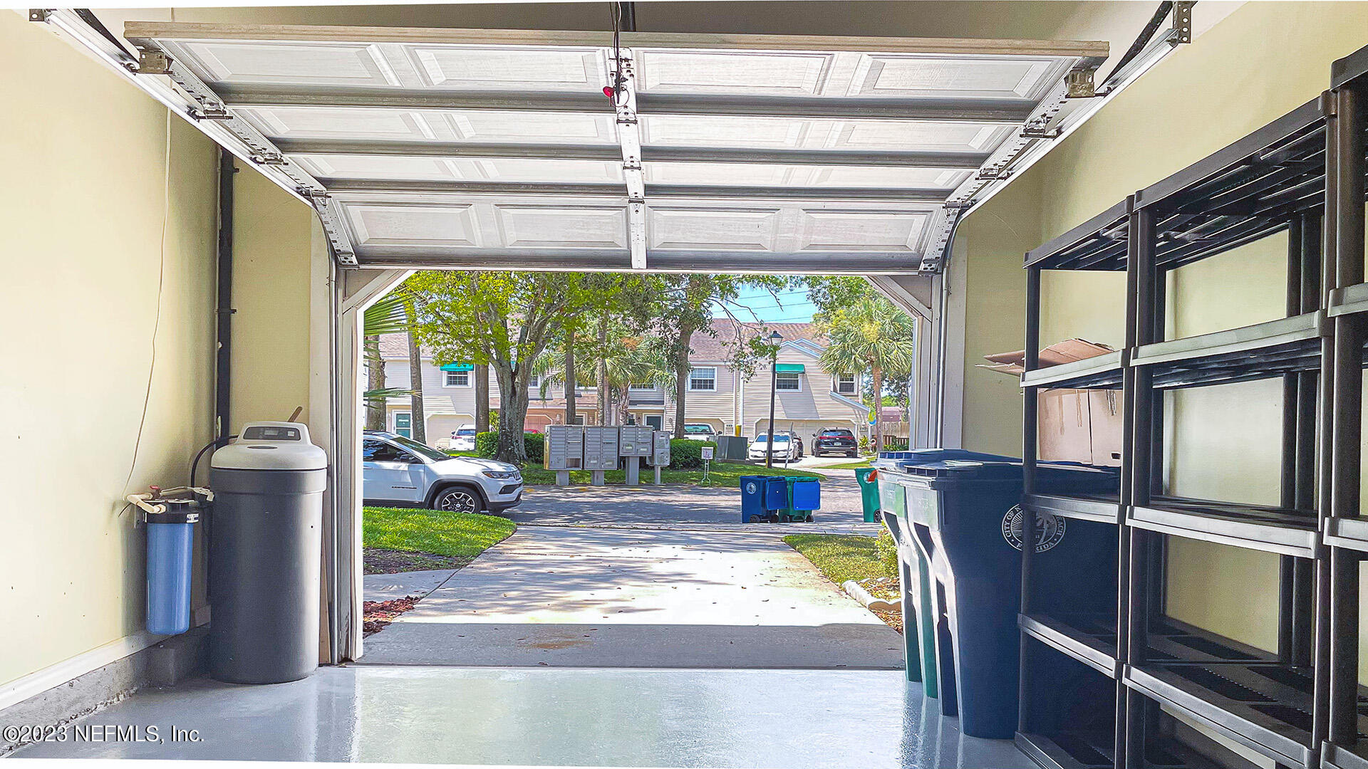 121 Sand Castle Way Neptune Beach, FL 32266 - Photo 33 of 39 a front view of a house with garden