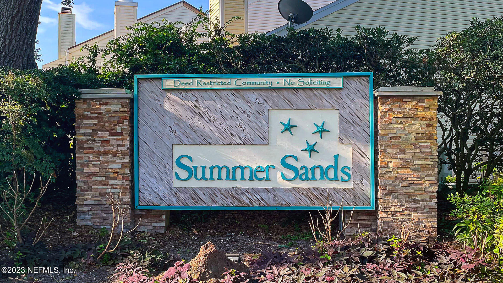 121 Sand Castle Way Neptune Beach, FL 32266 - Photo 34 of 39 a sign that is on the wall of building