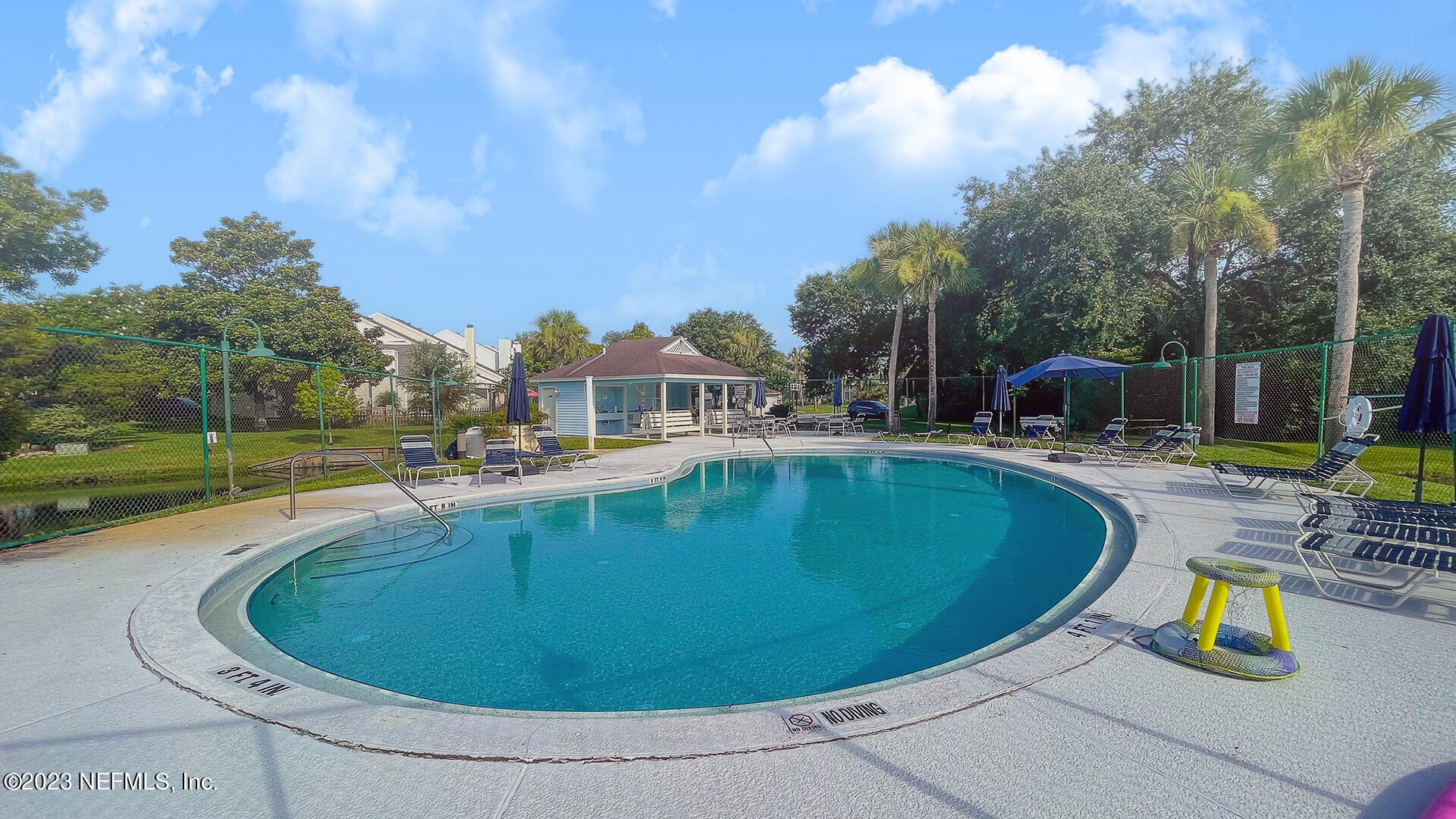 121 Sand Castle Way Neptune Beach, FL 32266 - Photo 39 of 39 a view of outdoor space yard swimming pool and outdoor kitchen