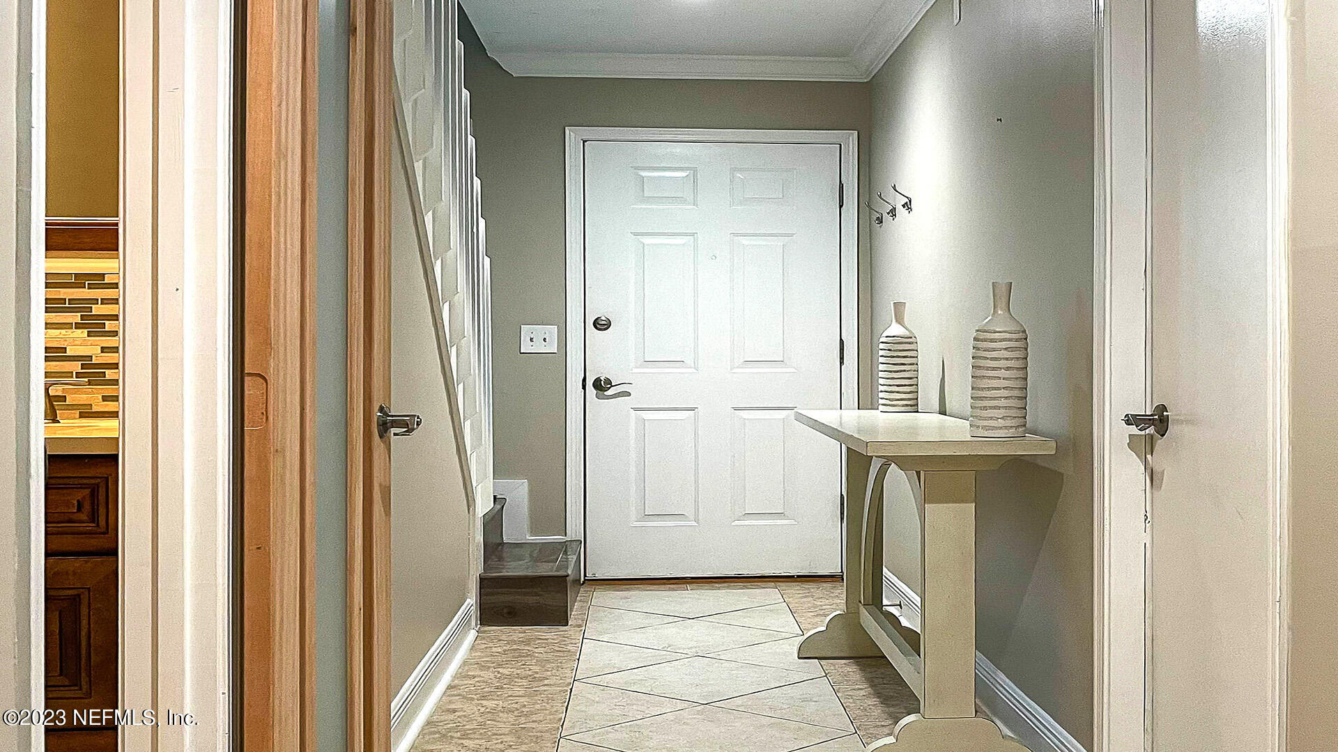 121 Sand Castle Way Neptune Beach, FL 32266 - Photo 4 of 39 a bathroom with a sink and a mirror