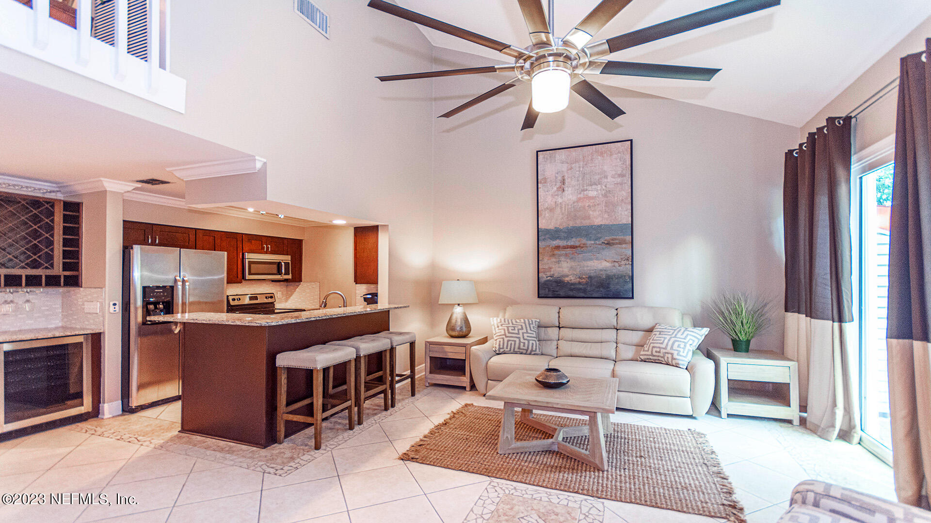 121 Sand Castle Way Neptune Beach, FL 32266 - Photo 5 of 39 a living room with furniture and a fireplace