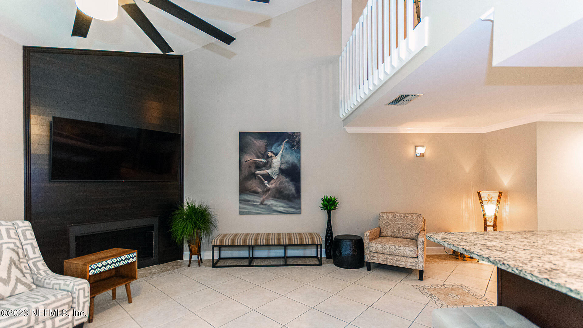 121 Sand Castle Way Neptune Beach, FL 32266 - Photo 8 of 39 a living room with furniture and a fireplace