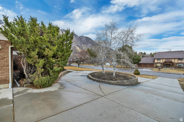 887 Village Way Alpine, UT 84004 - Photo 4 of 28 View of patio featuring a mountain view