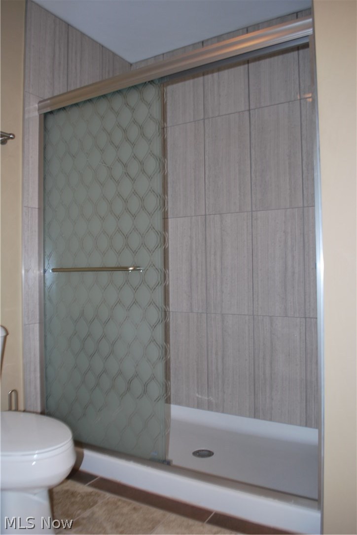 4260 Ridgewood Road Akron, OH 44321 - Photo 24 of 35 Master bath new tile surround and sliding glass doors.