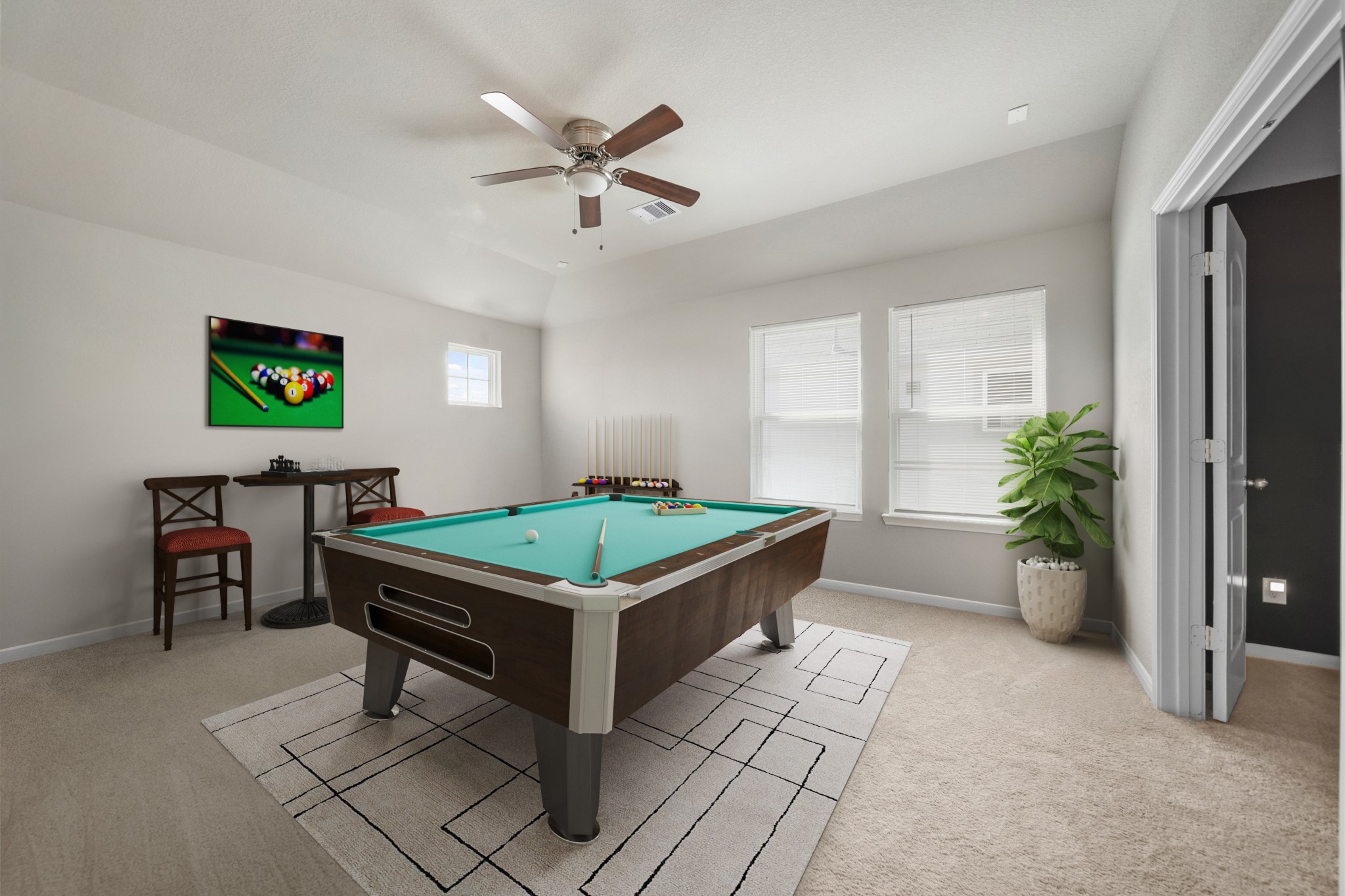 8802 Mallow Rose Way Rosharon, TX 77583 - Photo 21 of 29 Virtually Staged: Conveniently upstairs is this fabulous game room! Complete with carpet floors, large
windows with privacy blinds, and a ceiling fan. Convert this space into a kids' hangout, an adults hideaway, or whatever you can imagine!