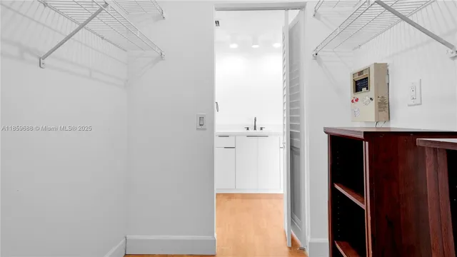 a view of balcony with wooden floor and fence