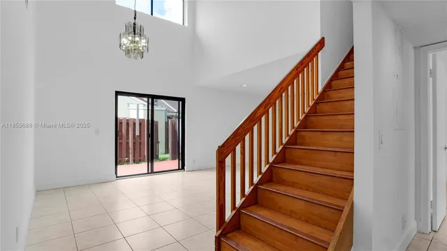 a view of a hallway with staircase
