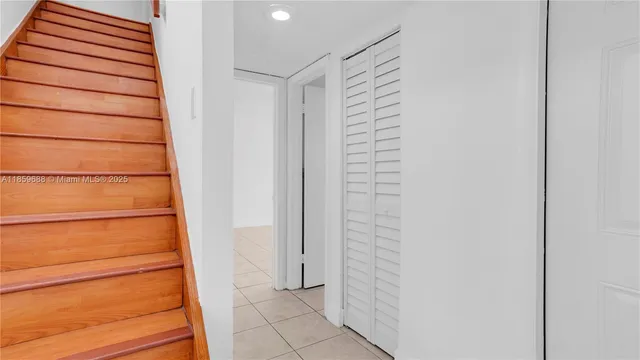 a view of a hallway with entryway