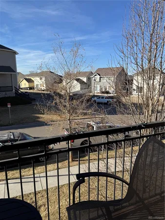 a view of a chairs and table on the deck