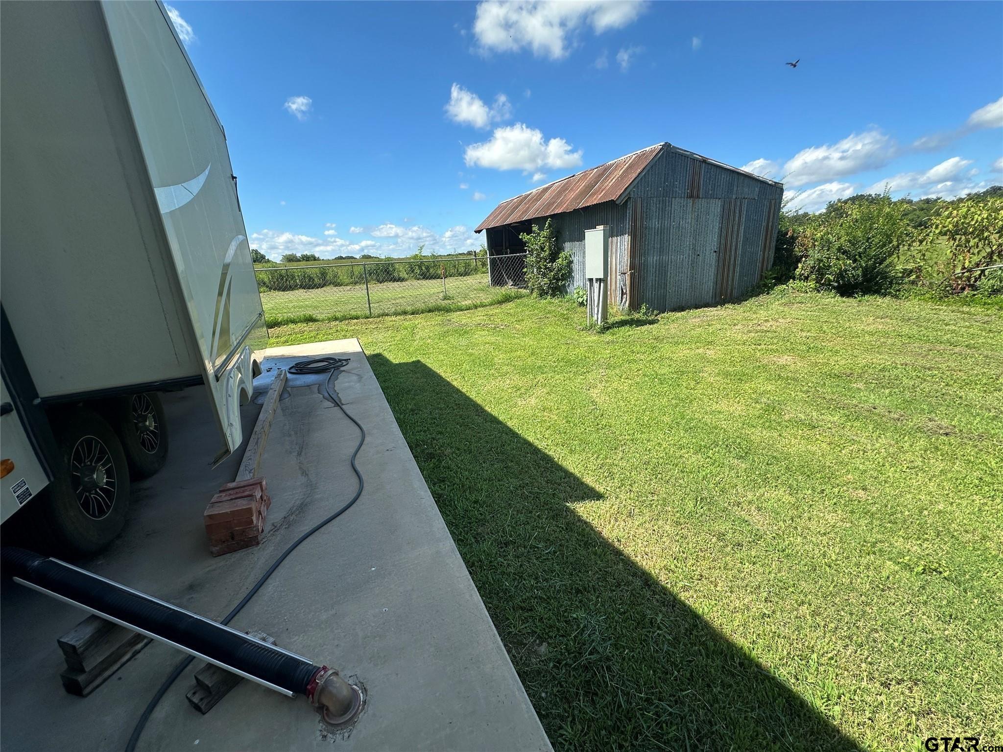 528 County Road 1830 Yantis, TX 75497 - Photo 5 of 13 a view of a backyard with pool