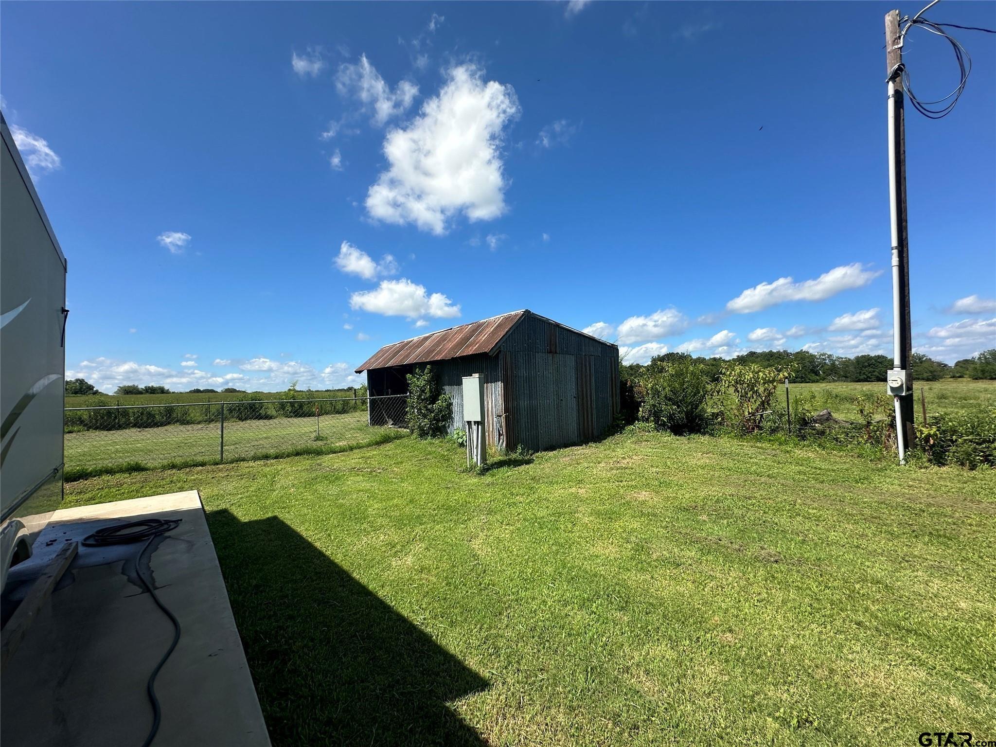 528 County Road 1830 Yantis, TX 75497 - Photo 6 of 13 a view of back yard of the house