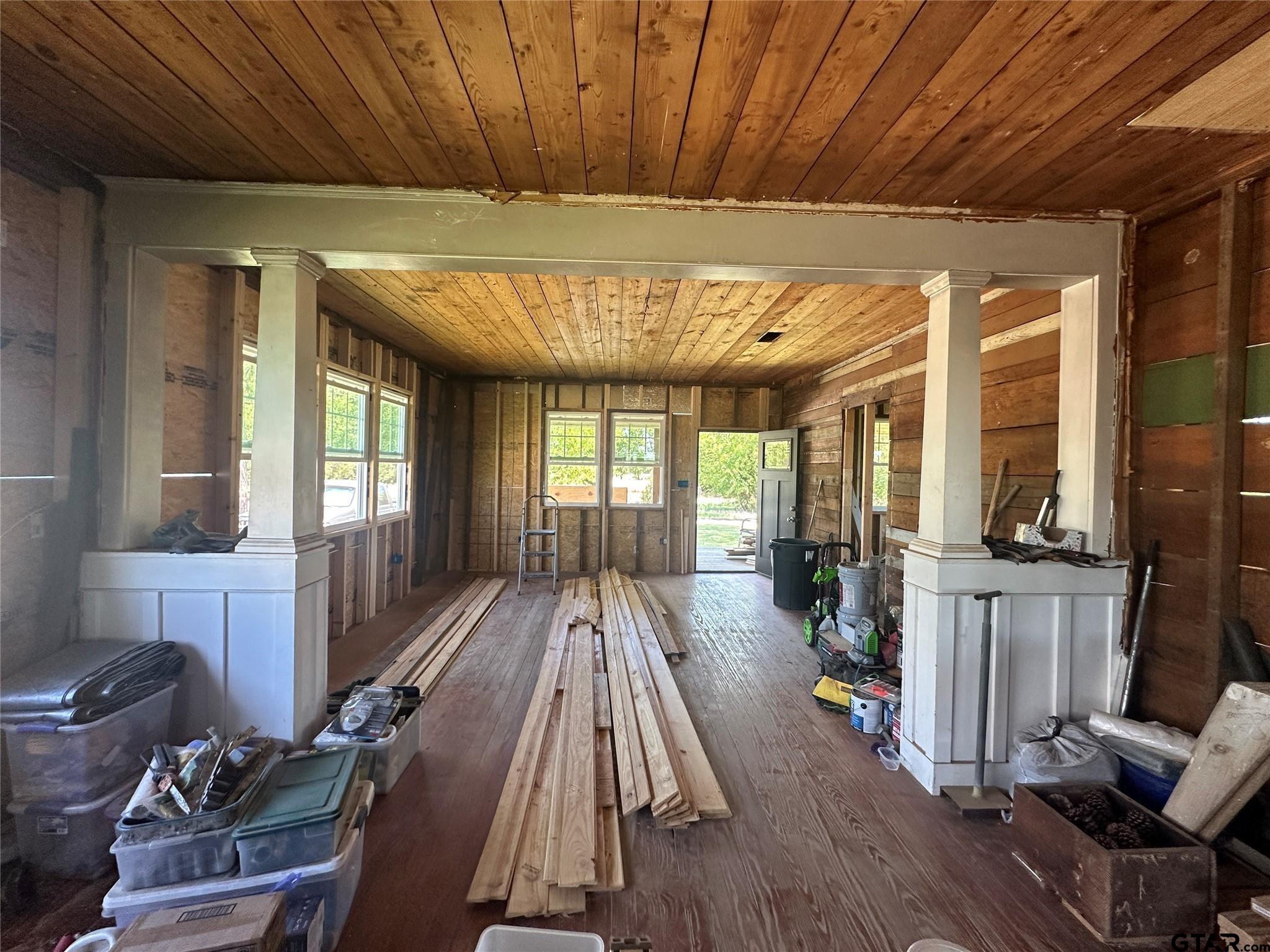 528 County Road 1830 Yantis, TX 75497 - Photo 8 of 13 a view of a room with furniture wooden floor and windows