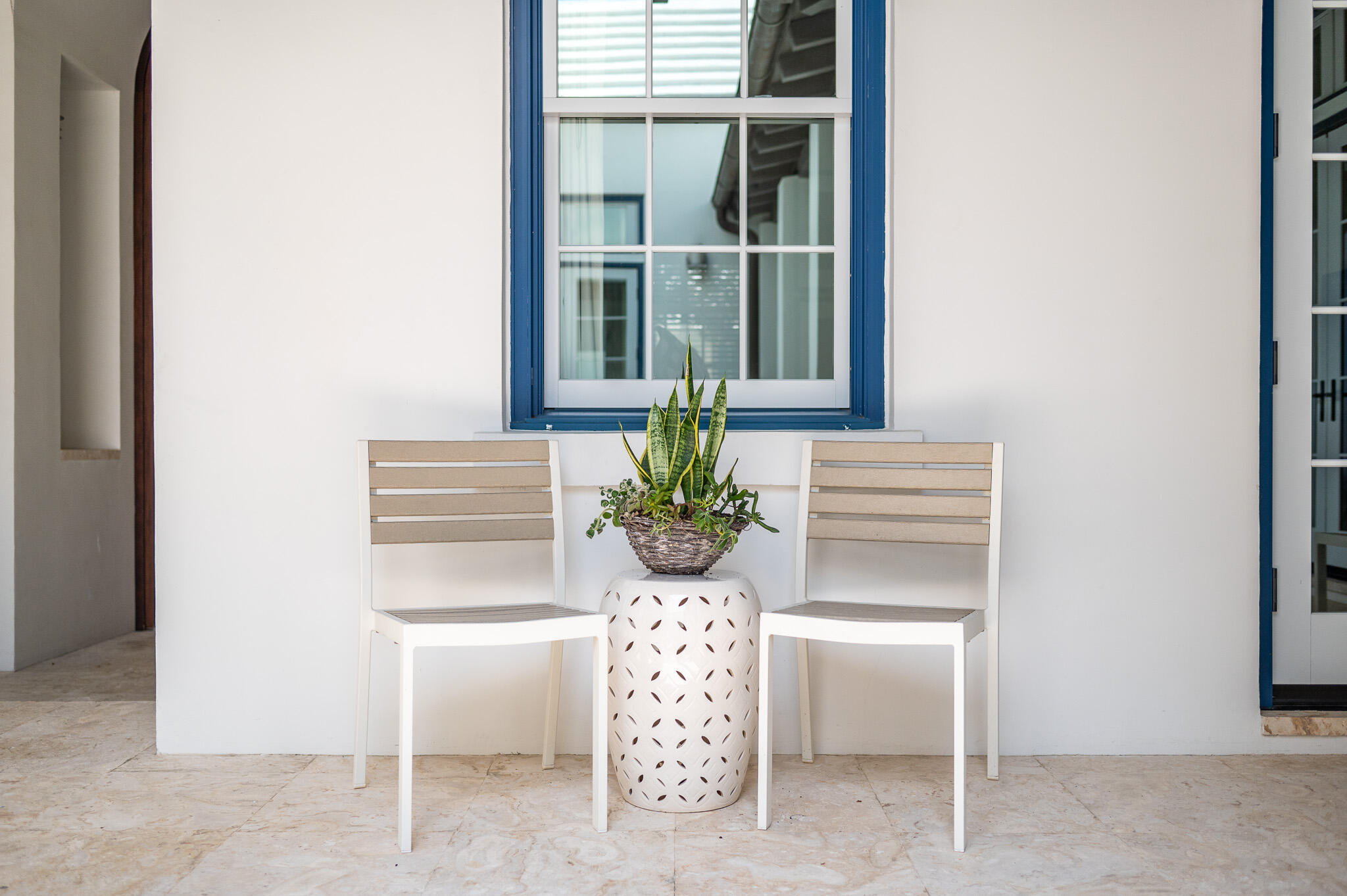 86 North Charles Street, Unit B9 Inlet Beach, FL 32461 - Photo 13 of 60 a view of a flower pot and a table chair