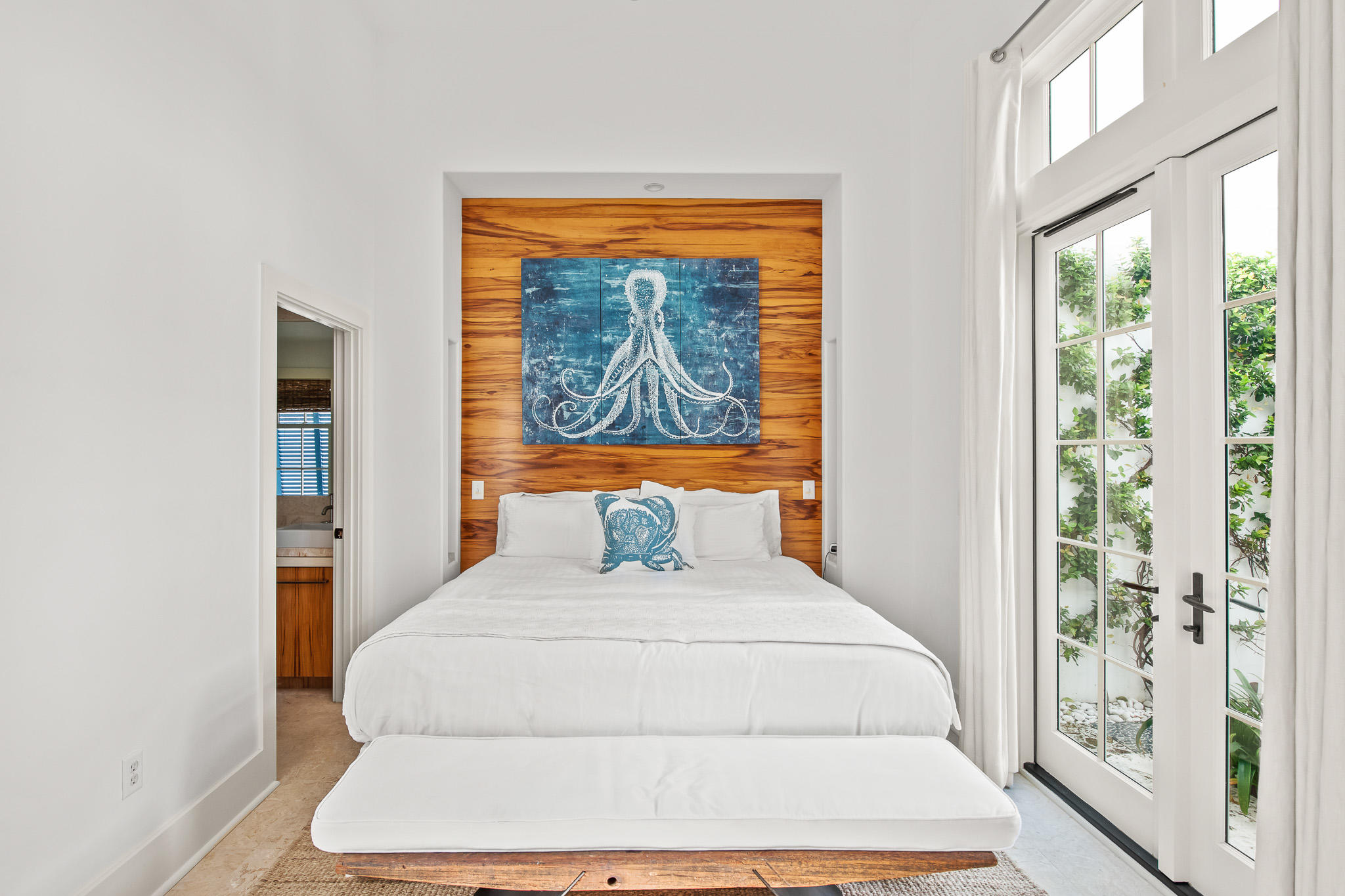86 North Charles Street, Unit B9 Inlet Beach, FL 32461 - Photo 35 of 60 a bedroom with a large bed and a large window