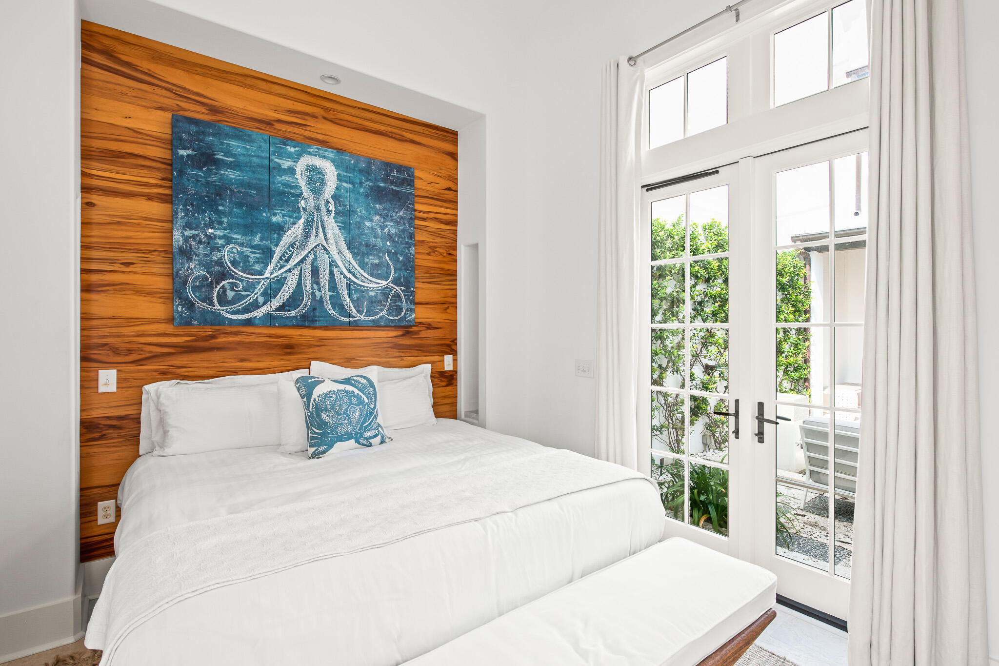 86 North Charles Street, Unit B9 Inlet Beach, FL 32461 - Photo 36 of 60 a bedroom with a bed and a painting on the wall