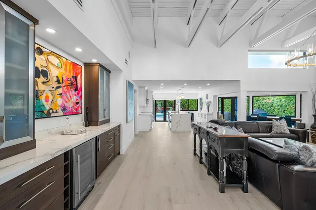 a view of a living room and dining room