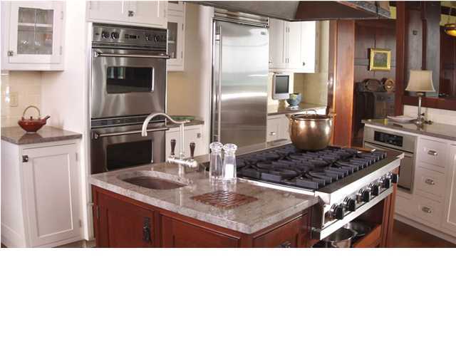 Undisclosed Address Santa Rosa Beach, FL 32459 - Photo 15 of 25 a kitchen with a stove a refrigerator and a sink