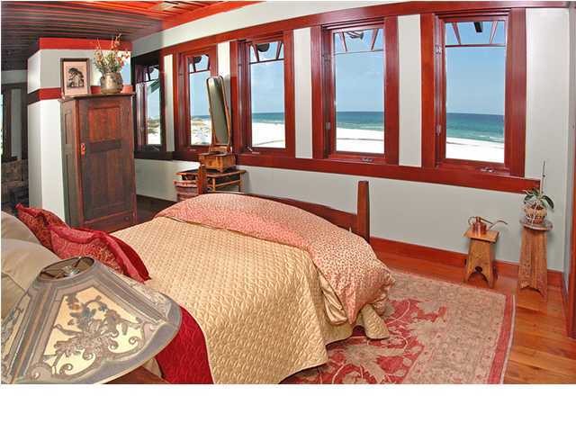 Undisclosed Address Santa Rosa Beach, FL 32459 - Photo 8 of 25 a bed sitting in a bedroom next to a window