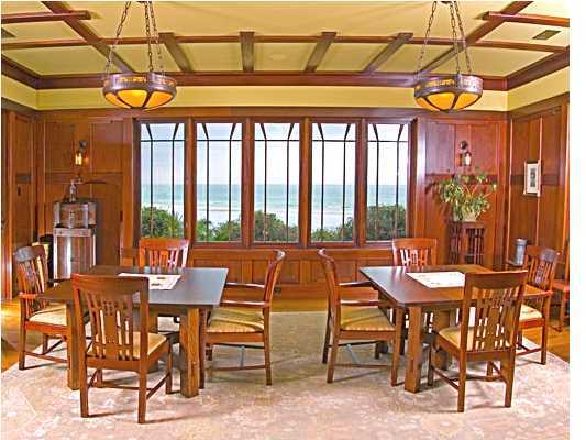 Undisclosed Address Santa Rosa Beach, FL 32459 - Photo 10 of 25 a view of a dining room with furniture large windows and wooden chandelier
