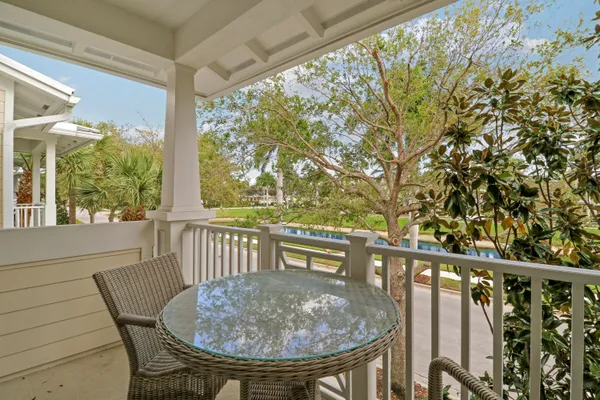 a view of balcony with furniture