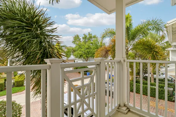 a view of a balcony with plants