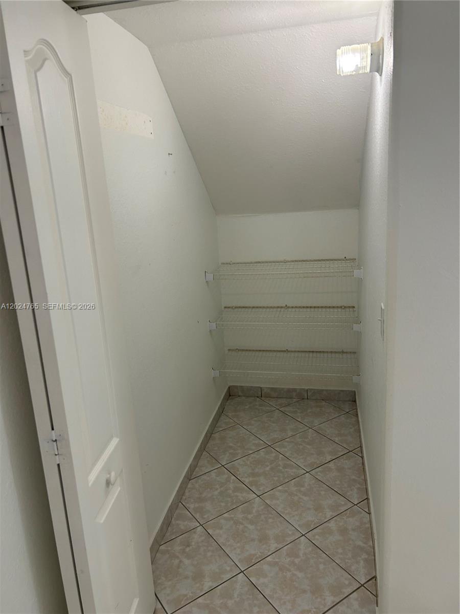 10919 West Okeechobee Road, Unit 101 Hialeah Gardens, FL 33018 - Photo 20 of 21 a view of small space