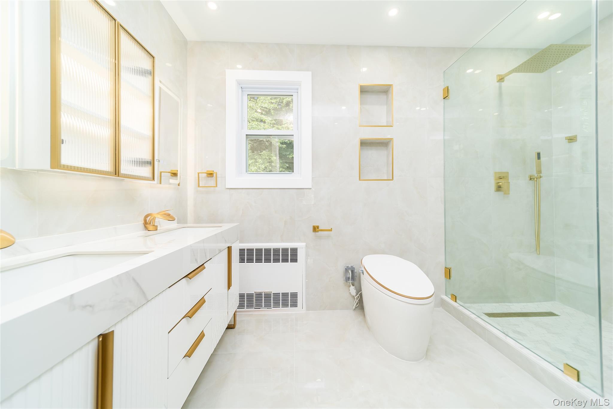 86-32 Midland Parkway Queens, NY 11432 - Photo 17 of 26 a bathroom with a sink toilet and shower