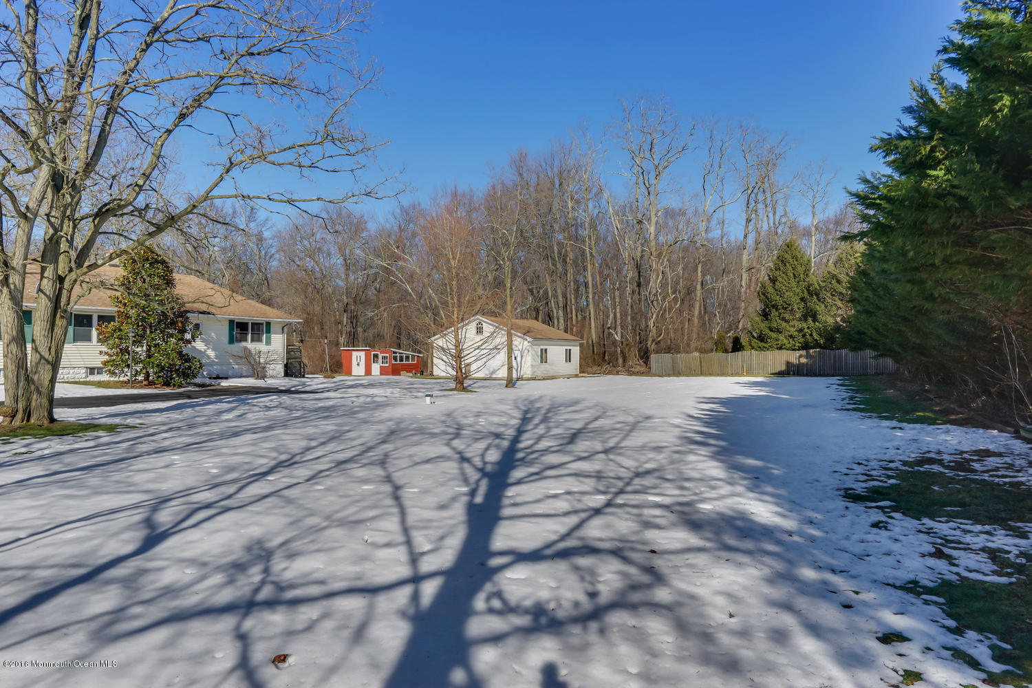 351 Iron Ore Road Manalapan, NJ 07726 - Photo 18 of 20 a view of road with trees