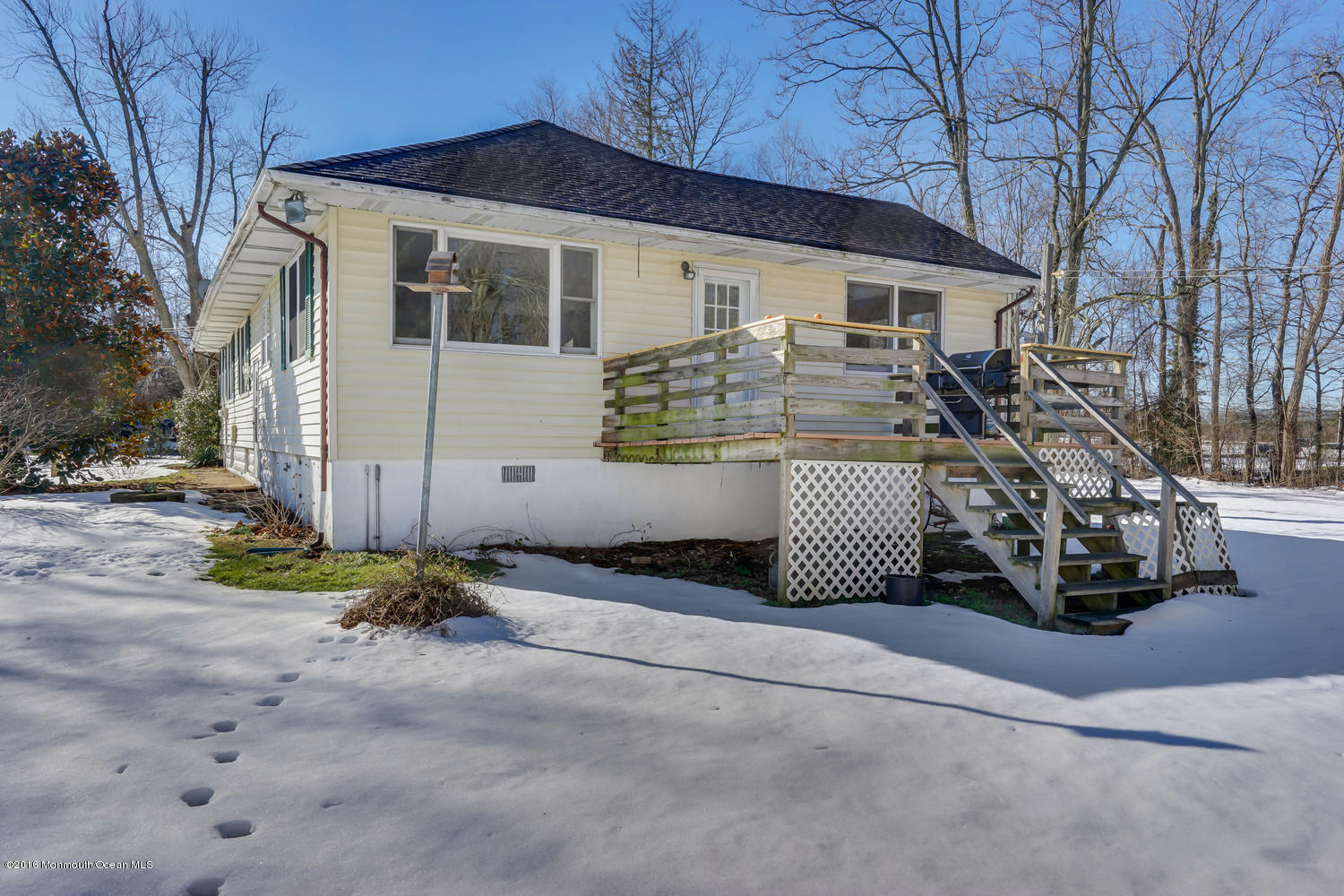 351 Iron Ore Road Manalapan, NJ 07726 - Photo 19 of 20 a view of back yard of the house