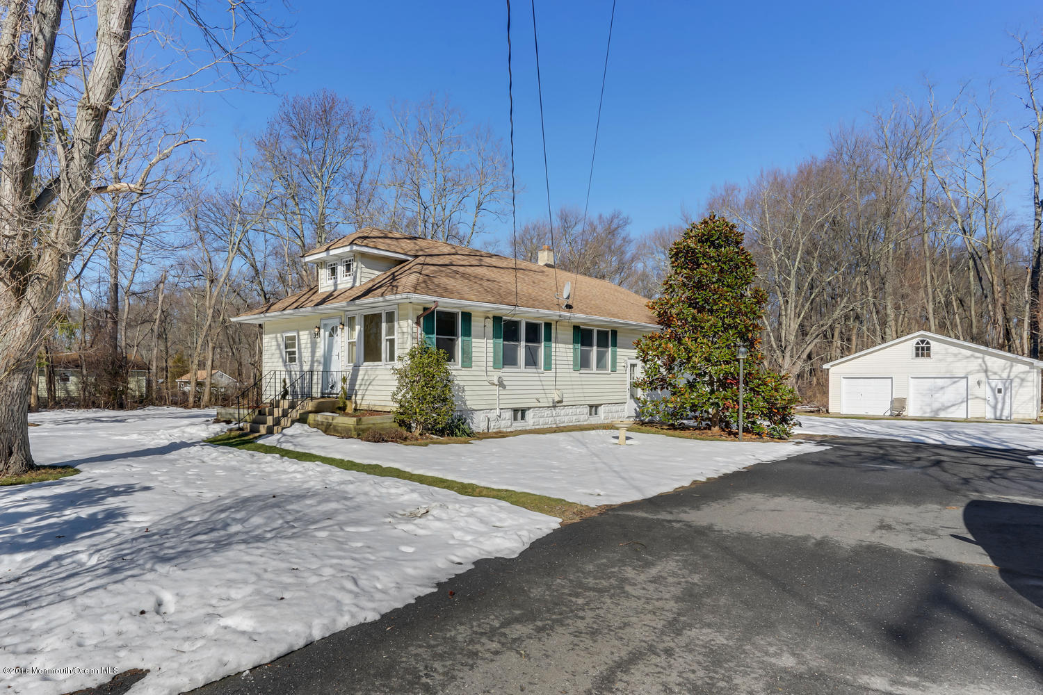 351 Iron Ore Road Manalapan, NJ 07726 - Photo 3 of 20 a front view of a house with a yard
