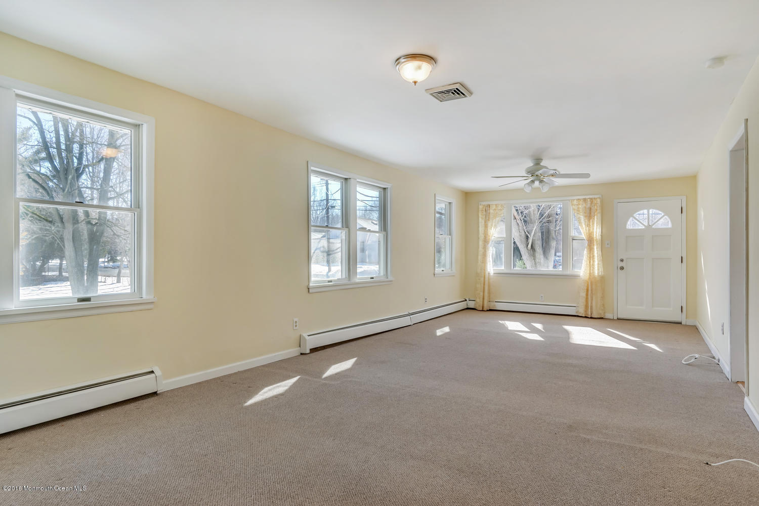 351 Iron Ore Road Manalapan, NJ 07726 - Photo 5 of 20 a view of an empty room with a window