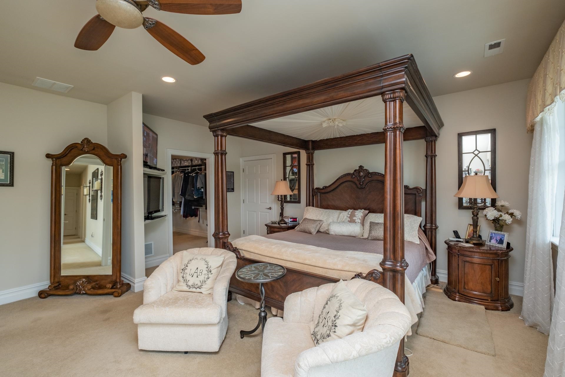286 Riverside Drive Port Republic, NJ 08241 - Photo 20 of 50 a bedroom with furniture and a chandelier