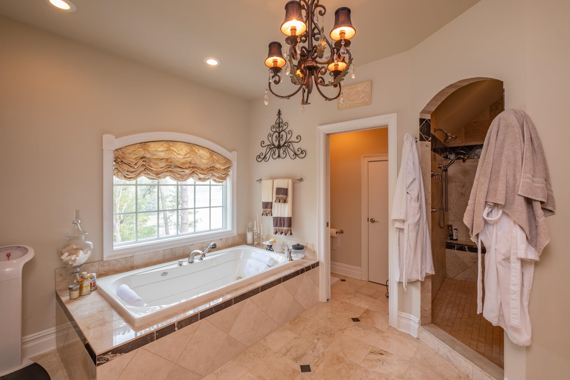 286 Riverside Drive Port Republic, NJ 08241 - Photo 24 of 50 a spacious bathroom with a granite countertop sink a mirror and a bathtub