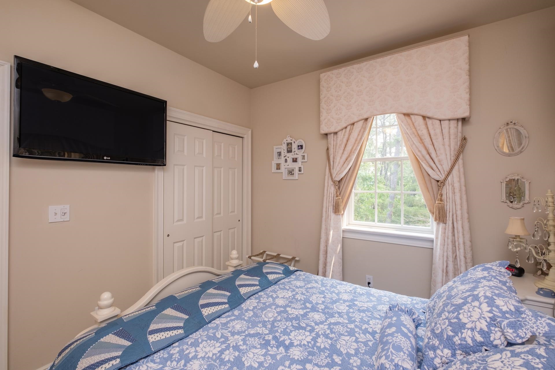 286 Riverside Drive Port Republic, NJ 08241 - Photo 30 of 50 a bedroom with a bed and a flat screen tv