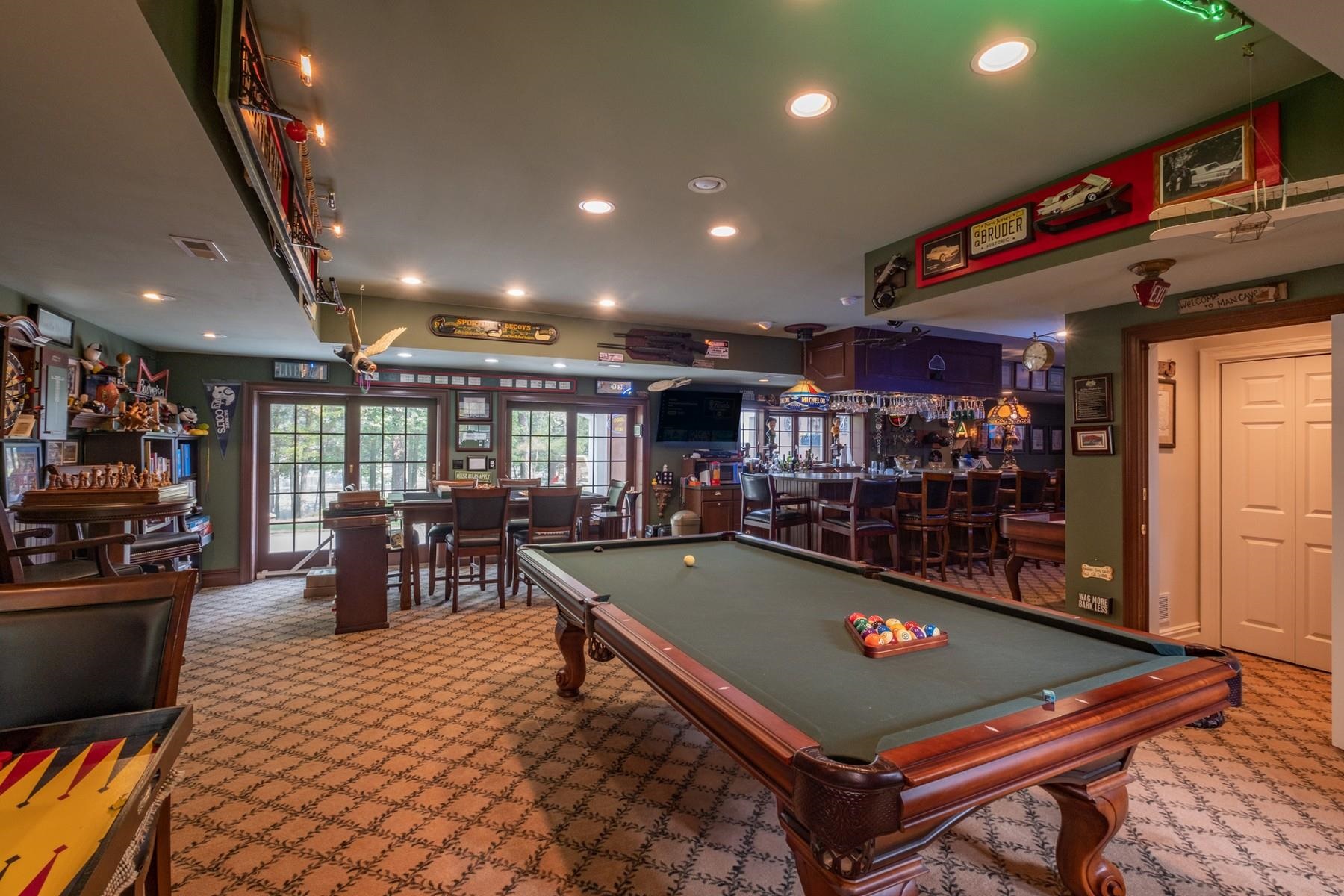 286 Riverside Drive Port Republic, NJ 08241 - Photo 38 of 50 a room with lots of furniture and windows