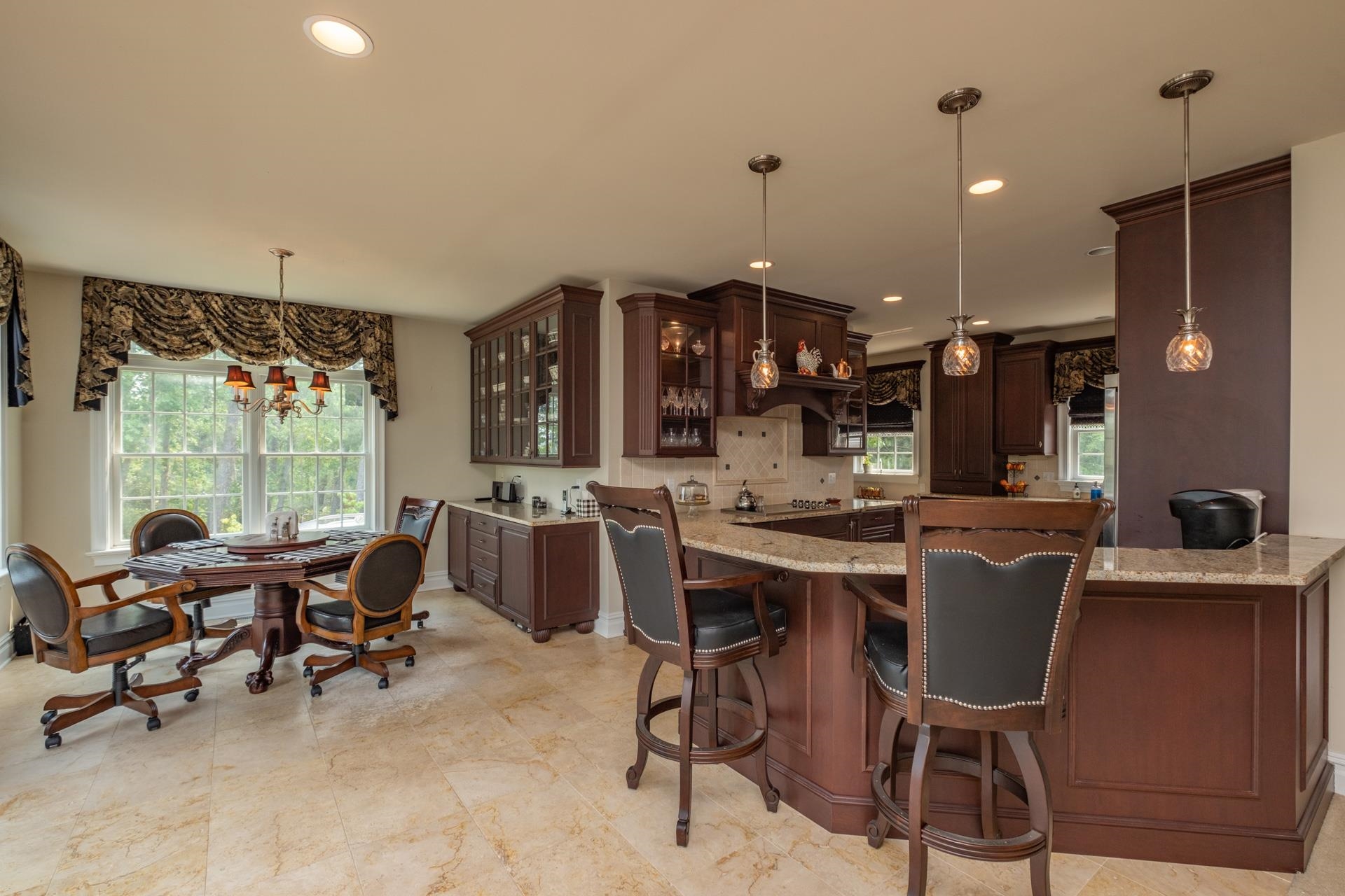 286 Riverside Drive Port Republic, NJ 08241 - Photo 9 of 50 a kitchen with a table and chairs in it