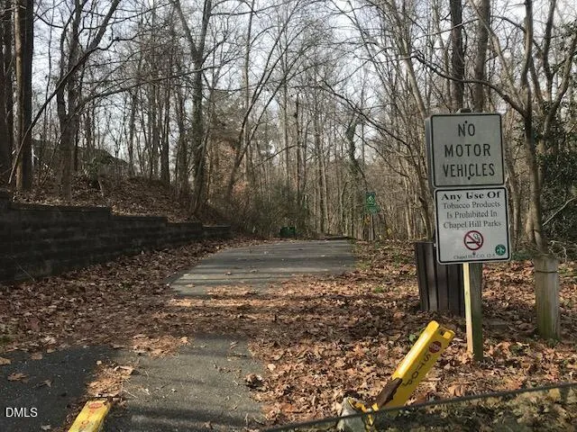 a sign board with parking space