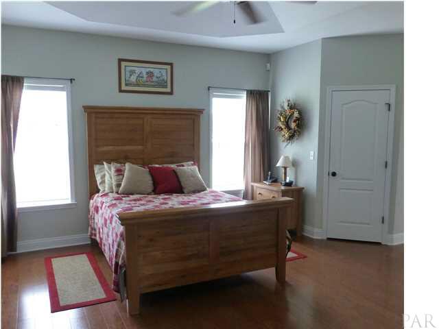 590 Ard Field Road Jay, FL 32565 - Photo 5 of 16 Master Bedroom with Trey Ceiling and His and Her Closets