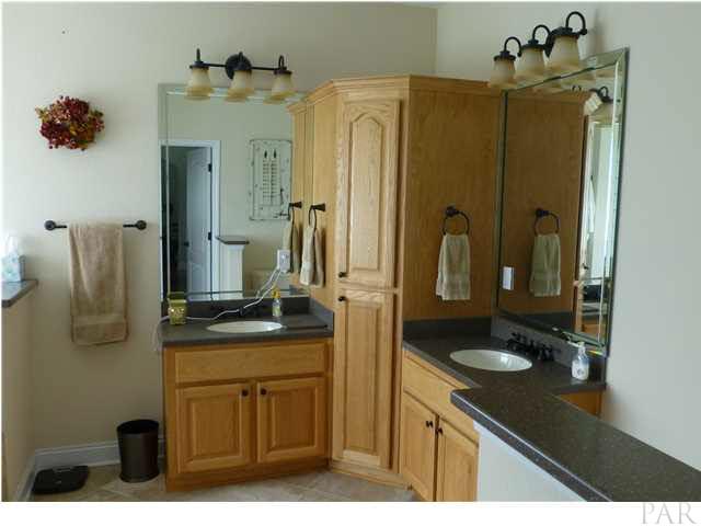 590 Ard Field Road Jay, FL 32565 - Photo 6 of 16 Master Bath with Jacuzzi Tub, Separate Shower and Corian Countertops